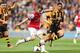HULL, ENGLAND - APRIL 20: Aaron Ramsey of Arsenal shoots to score his sides first goal during the Barclays Premier League match between Hull City and Arsenal at KC Stadium on April 20, 2014 in Hull, England. (Photo by Scott Heavey/Getty Images)