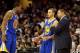 CLEVELAND, OH - DECEMBER 29: Head coach Mark Jackson of the Golden State Warriors speaks to Andre Iguodala #9 and Stephen Curry #30 of the Golden State Warriors in the fourth quarter against the Cleveland Cavaliers at Quicken Loans Arena on December 29, 2