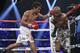 Manny Pacquiao landing a left hand on Tim Bradley