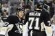 Feb 7, 2014; Pittsburgh, PA, USA; Pittsburgh Penguins center Sidney Crosby (87) talks to center Evgeni Malkin (71) during a time-out against the New York Rangers in the second period at the CONSOL Energy Center. The Rangers won 4-3 in a shootout. Mandato