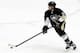 Apr 1, 2014; Pittsburgh, PA, USA; Pittsburgh Penguins defenseman Matt Niskanen (2) skates with the puck against the Carolina Hurricanes during the second period at the CONSOL Energy Center. Carolina won 4-1. Mandatory Credit: Charles LeClaire-USA TODAY Sp