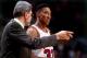 CHICAGO - 1996: Scottie Pippen #33 of the Chicago Bulls discusses strategy with head coach Phil Jackson during a 1996 NBA game at the United Center in Chicago, Illinois. NOTE TO USER: User expressly acknowledges that, by downloading and or using this pho