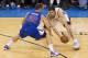 OKLAHOMA CITY, OK - May 13: Nick Collison #4 of the Oklahoma City Thunder looks to make a play with the ball against Blake Griffin #32 of the Los Angeles Clippers in Game 5 of the Western Conference Semifinals during the 2014 NBA Playoffs at the Chesapeak