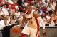 MIAMI, FL - MAY 14: Mario Chalmers #15 of the Miami Heat drives against the Brooklyn Nets in Game Five of the Eastern Conference Semifinals during the 2014 NBA playoffs at American Airlines Arena in Miami, Florida on May 14, 2014. NOTE TO USER: User expr