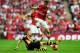 LONDON, ENGLAND - MAY 17: David Meyler of Hull City tackles Aaron Ramsey of Arsenal during the FA Cup with Budweiser Final match between Arsenal and Hull City at Wembley Stadium on May 17, 2014 in London, England. (Photo by Shaun Botterill/Getty Images)