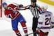 May 17, 2014; Montreal, Quebec, CAN; Montreal Canadiens forward Brandon Prust (8) and New York Rangers forward Chris Kreider (20) are separated by referee Brad Watson (23) during the third period in game one of the Eastern Conference Finals of the 2014 St