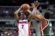 Mar 31, 2014; Auburn Hills, MI, USA; Detroit Pistons guard Brandon Jennings (7) shoots the ball over Milwaukee Bucks guard Brandon Knight (11) during the second quarter at The Palace of Auburn Hills. Mandatory Credit: Tim Fuller-USA TODAY Sports