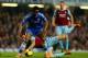 LONDON, ENGLAND - JANUARY 29: Stewart Downing of West Ham clashes with John Obi Mikel of Chelsea during the Barclays Premier League match between Chelsea and West Ham United at Stamford Bridge on January 29, 2014 in London, England. (Photo by Ian Walton/