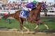 BALTIMORE, MD - MAY 17: California Chrome #3, ridden by Victor Espinoza, races to the finishline to win the 139th running of the Preakness Stakes at Pimlico Race Course on May 17, 2014 in Baltimore, Maryland. (Photo by Molly Riley/Getty Images)