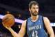 Apr 14, 2014; Oakland, CA, USA; Minnesota Timberwolves forward Kevin Love (42) between plays against the Golden State Warriors during the third quarter at Oracle Arena. The Golden State Warriors defeated the Minnesota Timberwolves 130-120. Mandatory Credi
