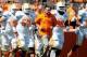 Apr 12, 2014; Knoxville, TN, USA; Tennessee Volunteers head coach Butch Jones runs onto the field during the orange and white spring game at Neyland Stadium. Mandatory Credit: Randy Sartin-USA TODAY Sports