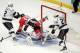 May 18, 2014; Chicago, IL, USA; Chicago Blackhawks center Jonathan Toews (19) falls over Los Angeles Kings goalie Jonathan Quick (32) after the puck went into the net during the second period in game one of the Western Conference Final of the 2014 Stanley