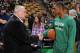 BOSTON, MA - APRIL 4: Rajon Rondo #9 of the Boston Celtics talks with legend Tommy Heinsohn before the game against the Philadelphia 76ers on April 4, 2014 at the TD Garden in Boston, Massachusetts. NOTE TO USER: User expressly acknowledges and agrees th