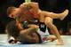 Aug 31, 2013; Milwaukee, WI, USA; Chad Mendes (top) fights Clay Guida during the UFC-164 bout at BMO Harris Bradley Center. Mandatory Credit: Benny Sieu-USA TODAY Sports
