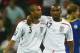 LONDON - OCTOBER 11: Jermain Defoe of England (R) celebrates with Ashley Cole (C) as he scores their fifth goal during the 2010 World Cup qualifying match between England and Kazakhstan at Wembley Stadium on October 11, 2008 in London, England. (Photo b