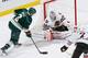 Minnesota Wild forward Charlie Coyle gets a chance on Chicago Blackhawks goalie Corey Crawford.
