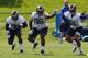 EARTH CITY, MO - MAY 16: Michael Sam #96, Maurice Alexander #31and Aaron Hill #51 of the St. Louis Rams participate in a rookie minicamp at Rams Park on May 16, 2014 in Earth City, Missouri. (Photo by Dilip Vishwanat/Getty Images)