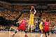 INDIANAPOLIS - MAY 18: Paul George #24 of the Indiana Pacers shoots the ball against the Miami Heat in game one of the East Conference Finals at Bankers Life Fieldhouse on May 18, 2014 in Indianapolis, Indiana. NOTE TO USER: User expressly acknowledges a