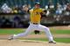 OAKLAND, CA - APRIL 23: Sonny Gray #54 of the Oakland Athletics pitches against the Texas Rangers in the top of the first inning at O.co Coliseum on April 23, 2014 in Oakland, California. (Photo by Thearon W. Henderson/Getty Images)