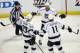 May 5, 2014; Anaheim, CA, USA; Los Angeles Kings right wing Marian Gaborik (12) celebrates with teammates Anze Kopitar (11) and Dustin Brown (23) after scoring a goal against the Anaheim Ducks during the first period in game two of the second round of the