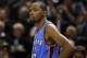 May 19, 2014; San Antonio, TX, USA; Oklahoma City Thunder forward Kevin Durant (35) reacts against the San Antonio Spurs in game one of the Western Conference Finals in the 2014 NBA Playoffs at AT&T Center. The Spurs won 122-105. Mandatory Credit: Soobum