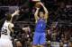 May 19, 2014; San Antonio, TX, USA; Oklahoma City Thunder forward Nick Collison (4) shoots the ball over San Antonio Spurs forward Tiago Splitter (22) in game one of the Western Conference Finals in the 2014 NBA Playoffs at AT&T Center. Mandatory Credit: