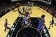 SAN ANTONIO, TX - MAY 19: Kawhi Leonard #2 of the San Antonio Spurs goes up for a shot against Steven Adams #12 of the Oklahoma City Thunder in the fourth quarter in Game One of the Western Conference Finals during the 2014 NBA Playoffs at AT&T Center on