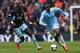 MANCHESTER, ENGLAND - MAY 11: Yaya Toure of Manchester City competes with Mohamed Diame of West Ham United during the Barclays Premier League match between Manchester City and West Ham United at the Etihad Stadium on May 11, 2014 in Manchester, England.