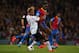 LONDON, ENGLAND - MAY 05: Glen Johnson of Liverpool and Yannick Bolasie of Crystal Palace compete for the ball during the Barclays Premier League match between Crystal Palace and Liverpool at Selhurst Park on May 5, 2014 in London, England. (Photo by Cl