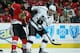 CHICAGO, IL - MAY 18: Anze Kopitar #11 of the Los Angeles Kings controls the puck against the defense of Jonathan Toews #19 of the Chicago Blackhawks in the first period of Game One of the Western Conference Final during the 2014 Stanley Cup Playoffs at