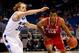 ORLANDO, FL - MARCH 20: T.J. Warren #24 of the North Carolina State Wolfpack drives the ball against Jake Barnett #30 of the Saint Louis Billikens during the second round of the 2014 NCAA Men's Basketball Tournament at Amway Center on March 20, 2014 in O