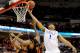RALEIGH, NC - MARCH 21: Jabari Parker #1 of the Duke Blue Devils goes up for the ball against Langston Hall #21 of the Mercer Bears in the first half in the second round of the 2014 NCAA Men's Basketball Tournament at PNC Arena on March 21, 2014 in Ralei