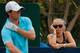 DUBAI, UNITED ARAB EMIRATES - NOVEMBER 17: Caroline Wozniacki of Denmark watches Rory McIlroy of Northern Ireland during the during the final round of the 2013 DP World Championships on the Earth Course at the Jumeirah Golf Estates on November 17, 2013 i