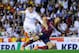VALENCIA, SPAIN - APRIL 16: Gareth Bale of Real Madrid CF shoots towards goal under a challenge by Javier Mascherano of FC Barcelona during the Copa del Rey Final between Real Madrid and FC Barcelona at Estadio Mestalla on April 16, 2014 in Valencia, Spa