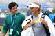 EASTBOURNE, ENGLAND - JUNE 20: Rory McIlroy and girlfriend Caroline Wozniacki leave the practice court during day six of the AEGON International tennis tournament at Devonshire Park on June 20, 2013 in Eastbourne, England. (Photo by Jan Kruger/Getty Ima