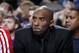 DALLAS, TX - JANUARY 7: Kobe Bryant #24 of the Los Angeles Lakers watches his team from the bench against the Dallas Mavericks on January 7, 2014 at the American Airlines Center in Dallas, Texas. NOTE TO USER: User expressly acknowledges and agrees that,