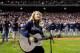 PHILADELPHIA - OCTOBER 25: Taylor Swift performs the national anthem before the Philadelphia Phillies take on the Tampa Bay Rays in game three of the 2008 MLB World Series on October 25, 2008 at Citizens Bank Park in Philadelphia, Pennsylvania. (Photo b