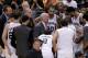 SAN ANTONIO, TX - MAY 19: Head coach Gregg Popovich of the San Antonio Spurs talks with his team during a time out in the first half while taking on the Oklahoma City Thunder in Game One of the Western Conference Finals during the 2014 NBA Playoffs at AT
