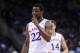 Mar 13, 2014; Kansas City, MO, USA; Kansas Jayhawks guard Andrew Wiggins (22) laughs while on the foul line during the second half against the Oklahoma State Cowboys in the second round of the Big 12 Conference college basketball tournament at Sprint Cent