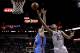 SAN ANTONIO, TX - MAY 19: Tim Duncan #21 of the San Antonio Spurs goes up for a shot against Nick Collison #4 of the Oklahoma City Thunder in the first half in Game One of the Western Conference Finals during the 2014 NBA Playoffs at AT&T Center on May 1