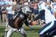 November 24, 2013; Oakland, CA, USA; Oakland Raiders defensive tackle Pat Sims (90) defends during the first quarter against the Tennessee Titans at O.co Coliseum. The Titans defeated the Raiders 23-19. Mandatory Credit: Kyle Terada-USA TODAY Sports