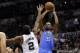 May 21, 2014; San Antonio, TX, USA; Oklahoma City Thunder forward Kevin Durant (35) shoots the ball over San Antonio Spurs forward Kawhi Leonard (2) in game two of the Western Conference Finals of the 2014 NBA Playoffs at AT&T Center. Mandatory Credit: So