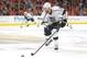 May 21, 2014; Chicago, IL, USA; Los Angeles Kings center Jeff Carter (77) with the puck during the first period of game two of the Western Conference Final of the 2014 Stanley Cup Playoffs against the Chicago Blackhawks at the United Center. Los Angeles w