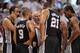 Jun 20, 2013; Miami, FL, USA; San Antonio Spurs head coach Gregg Popovich talks with San Antonio Spurs power forward Tim Duncan (21), point guard Tony Parker (9), and shooting guard Manu Ginobili (left) during the fourth quarter of game seven in the 2013