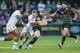 NORTHAMPTON, ENGLAND - MAY 16: Mike Haywood of Northampton is tackled by Jamie Gibson during the Aviva Premiership semi final match between Northampton Saints and Leicester Tigers at Franklin's Gardens on May 16, 2014 in Northampton, England. (Photo by