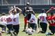 TAMPA, FL - MAY 16: Head Coach Lovie Smith of the Tampa Bay Buccaneers looks on during workouts during the first day of rookie minicamp on May 16, 2014 at One Buc Place in Tampa, Florida. (Photo by Brian Blanco/Getty Images)