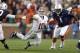 Auburn DT Montravius Adams (1) chases former Alabama QB AJ McCarron