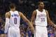 May 3, 2014; Oklahoma City, OK, USA; Oklahoma City Thunder guard Russell Westbrook (0) slaps hands with forward Kevin Durant (35) after a play in action against the Memphis Grizzlies in game seven of the first round of the 2014 NBA Playoffs at Chesapeake