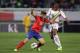 CHEONAN, SOUTH KOREA - OCTOBER 15: Son Heung-Min of South Korea competes for the ball with Samba Sow of Mali during the international friendly match between South Korea and Mali at Cheonan Stadium on October 15, 2013 in Cheonan, South Korea. (Photo by C