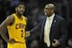 Apr 5, 2014; Cleveland, OH, USA; Cleveland Cavaliers head coach Mike Brown talks to guard Kyrie Irving (2) in the first quarter against the Charlotte Bobcats at Quicken Loans Arena. Mandatory Credit: David Richard-USA TODAY Sports
